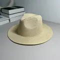 Classic Panama straw hat for sun protection with a stylish woven jazz fedora design. - One Size Adjustable / Plain / Beige