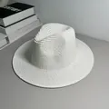 Close-up view of a classic white Panama straw hat for summer sunshade and beach style. - One Size Adjustable / Plain / White