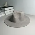 Detailed macro shot of the fine weave on a grey Panama style straw beach sun hat - One Size Adjustable / Plain / Gray