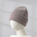 Close-up detail of a soft rabbit hair blend knit beanie featuring a warm ribbed texture - Mocha