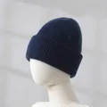 Close-up detail of thick navy blue rabbit fur knit beanie shown on mannequin head - Navy Blue