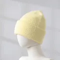 Close-up of pale yellow rabbit fur knit beanie showing thick warm ribbed texture - Milky Yellow