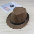 Detailed view of the woven straw fedora hat with a black leather band and metal buckle - Coffee (Belt)