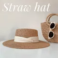 Elegant handwoven flat top straw sun hat for women with cream ribbon decoration - One Size / Brown with White Ribbon