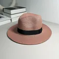 Close-up detail of a pink straw Panama hat with a black ribbon band and woven texture - One Size Adjustable / Ribbon Style (Detachable) / Dusty Pink