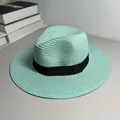 Close-up detail of mint green Panama straw hat featuring elegant black ribbon band. - One Size Adjustable / Ribbon Style (Detachable) / Pale Lake Green