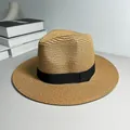 Detail of a natural woven straw Panama hat with a classic black ribbon band. - One Size Adjustable / Ribbon Style (Detachable) / Khaki