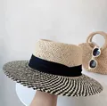 Elegant women's summer flat top straw hat with a striped wide brim and black ribbon - One Size / Black and White Striped