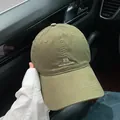 Olive green soft crown baseball cap featuring minimalist embroidery for a street style look - Adjustable / Olive Green