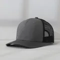 Professional close-up side view of a minimalist grey and black mesh trucker baseball cap - Adjustable (56-58cm) / Gray with Black Mesh