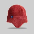 Detailed texture of thick brick red knitted beanie with snowflake patch and warm ear flaps - Elastic Circumference (56-59cm) / Dark Red