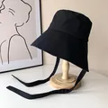 Chapeau cloche noir en toile avec lanières pour une protection solaire estivale - Noir