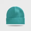 Front view of a teal ribbed knit beanie with a wide cuffed brim on a grey background - Elastic Circumference (56-60cm) / Lake Green
