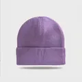 Close-up detail showing the purple ribbed knit texture and folded cuff of a winter beanie. - Elastic Circumference (56-60cm) / Light Purple