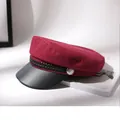 Classic red wool navy hat with a black leather brim and silver decorative button - Burgundy