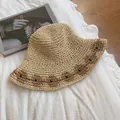 Handgewebter Raffia-Strohhut für Damen mit braunem Akzent für den sommerlichen Sonnenschutz - Beige