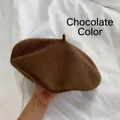 Close-up of chocolate brown wool beret showing its soft texture and classic shape. - M (56-58cm) / Chocolate