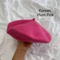 Close-up detail of a classic plum pink wool beret with a soft and fuzzy texture - M (56-58cm) / Korean Plum Pink