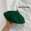 Detailed view of a dark green wool beret showing soft felt texture and classic design - M (56-58cm) / Dark Green