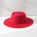 Close-up of a vintage red wool felt boater hat with a flat top and wide brim. - M (56-58cm) Adjustable / Bright Red