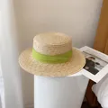 Handcrafted women's wide brim straw sun hat featuring a vibrant green ribbon detail - M (56-58cm) / Yellow-Green
