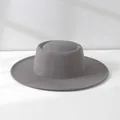 Classic grey woolen wide-brim jazz hat with flat top design in a soft studio light. - M (56-58cm) Adjustable / Light Gray