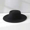 Detailed view of a vintage French black wool boater hat with a structured flat top. - M (56-58cm) Adjustable / Black
