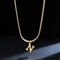 Close-up detail of 18K gold plated stainless steel letter N initial pendant on a snake chain - Letter N (11851_14) / Gold