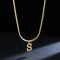 Close-up of golden stainless steel snake chain necklace with an initial S pendant - Letter S (11851_19) / Gold