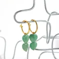 Close-up of French vintage hoop earrings with green heart-shaped stone pendants - Green Double Heart Stone Style (21855_10)