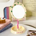 Cute cream desktop makeup mirror featuring green polka dots and a pink wavy stand - Beige