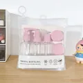 Tragbares rosa Reiseflaschen-Set mit Sprühflaschen in einer transparenten Tasche - 8-teiliges Set / Hellrosa