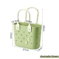 Avocado green portable picnic and bathroom storage basket with floral cutout design - Round Hole Avocado Green