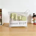 Hellgrünes Reise-Abfüllset mit Sprüh- und Pumpflaschen in einer klaren Tasche - 7-teiliges Set / Grün