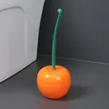 Decorative cherry-shaped toilet brush with orange base and long green handle for bathroom - 1 Piece / Orange