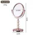 Eleganter doppelseitiger drehbarer Schminkspiegel mit Perlenständer in Roségold - Oval / Ovales Gold