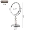 Eleganter ovaler silberner doppelseitiger Make-up-Spiegel mit drehbarem Perlenständer - Oval / Ovales Silber