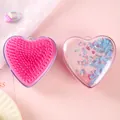 Herzförmige Massage-Haarbürste mit rosa Flüssigglitzer und Flamingo-Design. - Herz Flamingo / Rosa