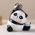 Süße Panda-Figur aus Harz mit Teetasse, kreative Tischdeko und Autogeschenkdekoration - Tee Servieren Stil / Tee Trinken