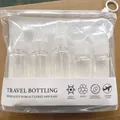 Komplettes klares Reiseflaschen-Set mit Sprüh- und Pumpflaschen in einer Tragetasche - 9-teiliges Set / Transparent