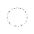 Macro detail of a silver-toned barbed wire thorn necklace in hip-hop punk style on white. - 11515_2 (Silver Thorn Style)