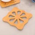 Hollow carved bamboo petal coaster for heat insulation and anti-slip table protection - Square Plum Blossom
