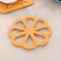 Floral hollow wooden coaster for kitchen heat insulation and table surface protection - Round Plum Blossom