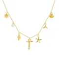 Collana da spiaggia dorata con ciondoli a forma di conchiglia, stella e perla. - Lettera T / Oro