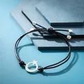 Bracciale cordoncino nero fatto a mano con ciondolo a mezzaluna e stella argento. - Stile Stella e Luna Nera
