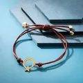 Bracciale intrecciato marrone-rosso fatto a mano con ciondolo luna e stella dorato. - Stella Luna Rosso Marrone