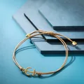 Bracciale artigianale in corda intrecciata marrone con charm ancora dorata minimalista - Ancora Marrone Chiaro