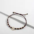 Elegante bracciale cordino intrecciato marrone fatto a mano con perle oro e ciondolo onda - Onda Marrone
