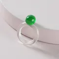 Minimalist transparent acrylic ring featuring a vibrant green spherical bead - Green Round Ball Decor Transparent Ring (R177_4)