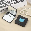 Portable double-sided folding compact makeup mirror featuring a cute blue cat design - Cat Hot Stamping Pattern / 6.6*7CM / Sky Blue
